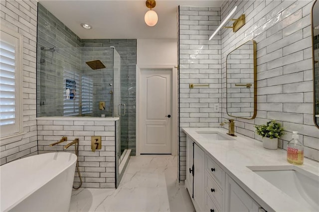 3355 Olivia Ct, Cumming, GA 30041 - bathroom featuring a freestanding bath, a stall shower, double vanity, and marble look tile flooring