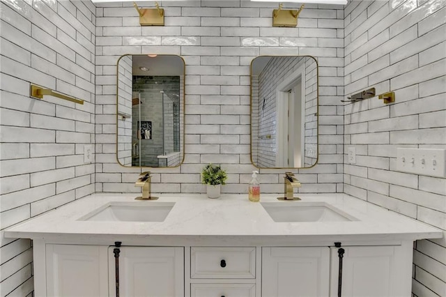 3355 Olivia Ct, Cumming, GA 30041 - full bath with double vanity, a stall shower, tasteful backsplash, and tile walls