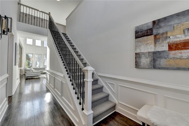 3355 Olivia Ct, Cumming, GA 30041 - stairs with a decorative wall, a wainscoted wall, and wood finished floors
