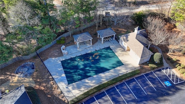 3355 Olivia Ct, Cumming, GA 30041 - view of swimming pool with a fenced backyard, a gazebo, a patio, and an outbuilding