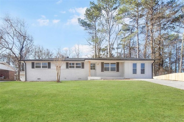 ranch-style home with a front lawn