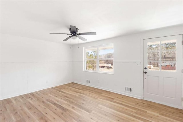 interior space featuring light wood-type flooring and ceiling fan