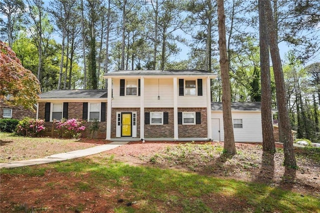 view of front of property featuring brick siding