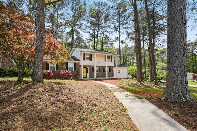 view of front of house with brick siding