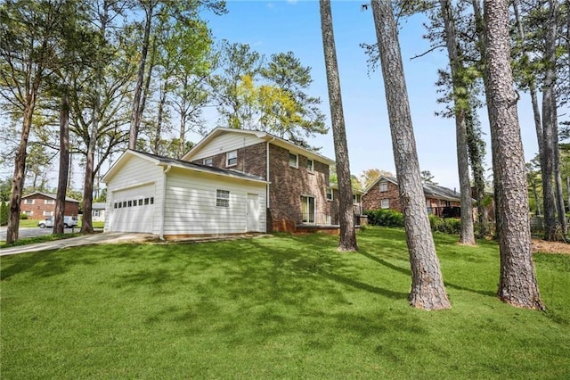 view of side of home with an attached garage, a lawn, and driveway