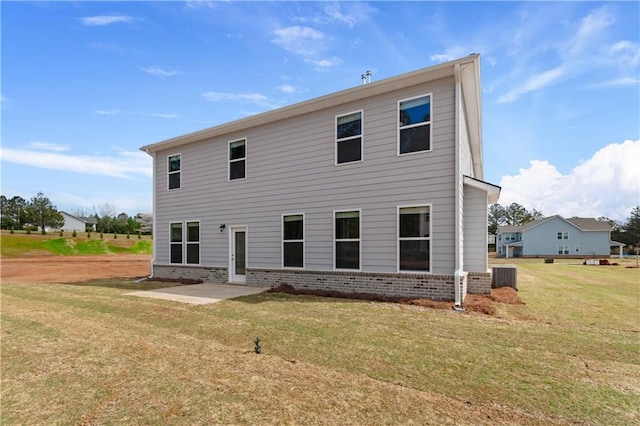 138 Crabbswood Dr, Mcdonough, GA 30253 - rear view of house with a lawn, a patio, and brick siding