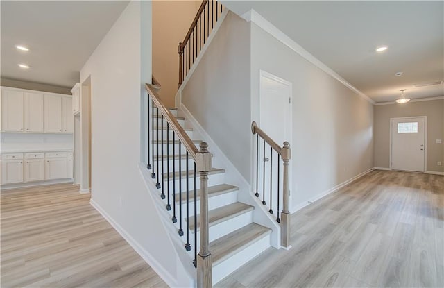 138 Crabbswood Dr, Mcdonough, GA 30253 - stairway featuring ornamental molding, baseboards, and wood finished floors