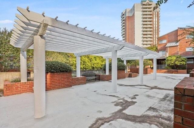 view of patio featuring a pergola