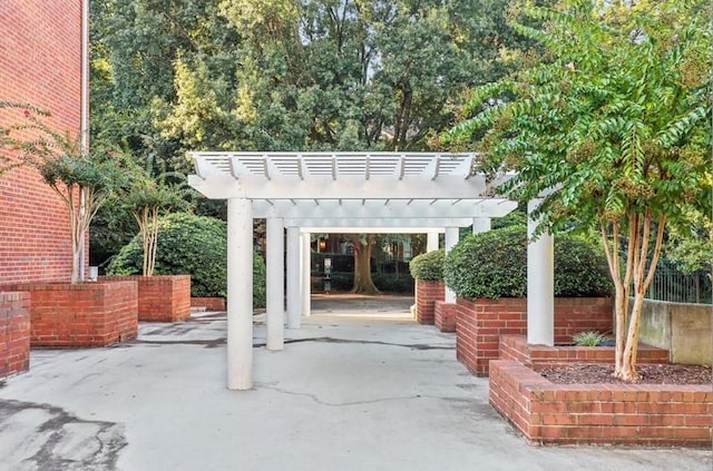 view of patio featuring a pergola