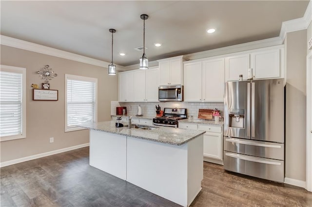 1102 Kingswood Way, Hoschton, GA 30548 - kitchen featuring stainless steel appliances, a sink, crown molding, white cabinetry, and tasteful backsplash