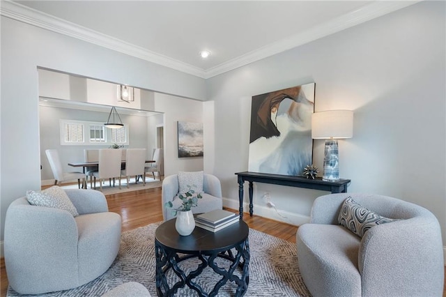 1066 High Point Dr, Atlanta, GA 30306 - living room featuring wood finished floors, crown molding, and recessed lighting