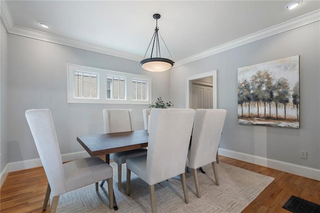 1066 High Point Dr, Atlanta, GA 30306 - dining space featuring ornamental molding and wood finished floors