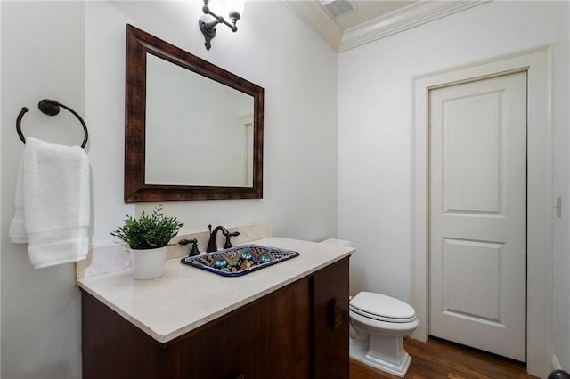 1066 High Point Dr, Atlanta, GA 30306 - bathroom featuring ornamental molding, wood finished floors, and vanity