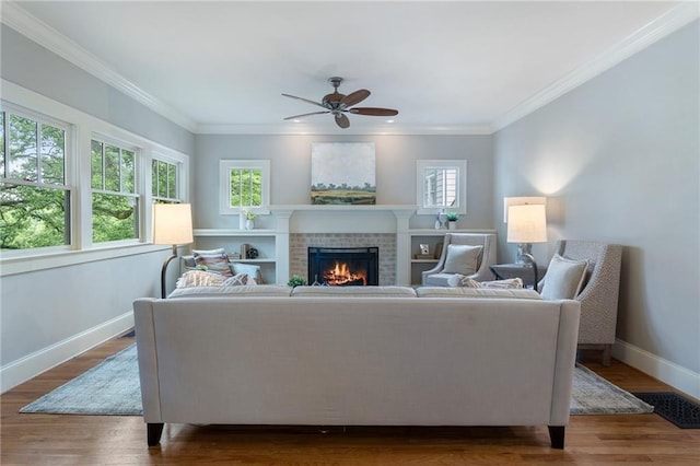 1066 High Point Dr, Atlanta, GA 30306 - living room with a fireplace, ceiling fan, ornamental molding, and wood finished floors