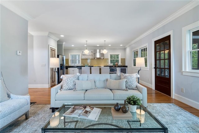 1066 High Point Dr, Atlanta, GA 30306 - living area with recessed lighting, wood finished floors, crown molding, and beverage cooler