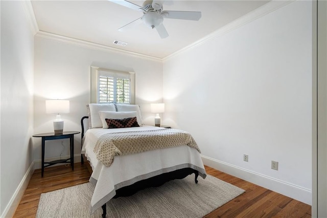 1066 High Point Dr, Atlanta, GA 30306 - bedroom featuring crown molding, wood finished floors, and a ceiling fan