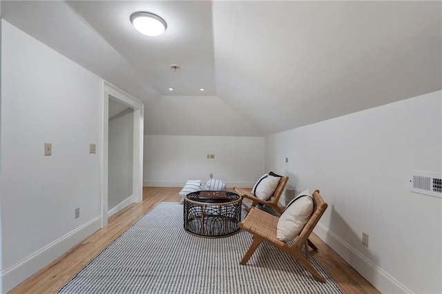 1066 High Point Dr, Atlanta, GA 30306 - sitting room featuring light wood-type flooring and vaulted ceiling