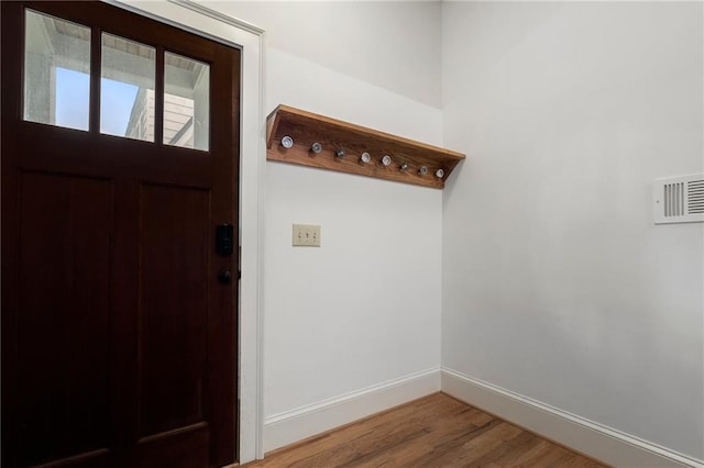 1066 High Point Dr, Atlanta, GA 30306 - entryway with baseboards and wood finished floors