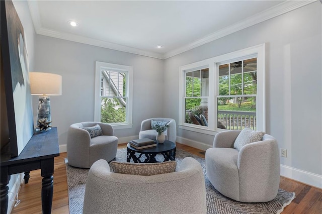 1066 High Point Dr, Atlanta, GA 30306 - sitting room with wood finished floors, ornamental molding, and recessed lighting