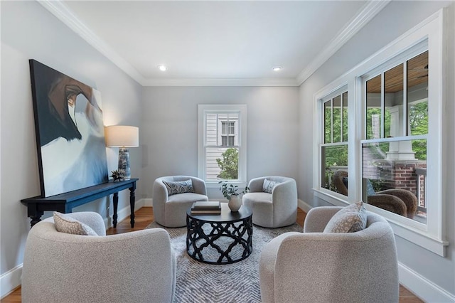 1066 High Point Dr, Atlanta, GA 30306 - living area with wood finished floors, crown molding, and recessed lighting