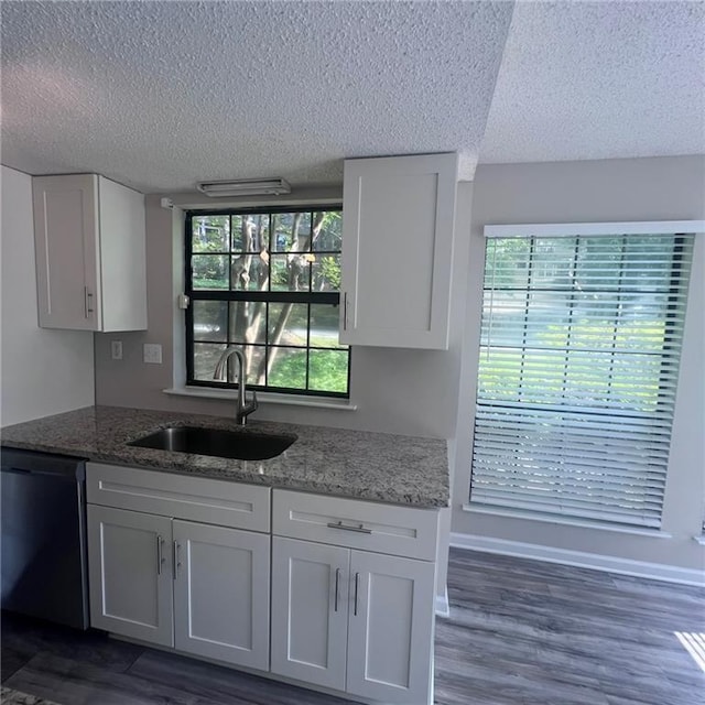 3045 Steeplechase, Alpharetta, GA 30004 - kitchen with dishwasher, a sink, a textured ceiling, white cabinets, and light stone counters