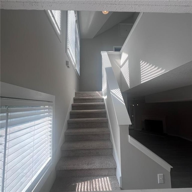 3045 Steeplechase, Alpharetta, GA 30004 - stairway with a fireplace with raised hearth