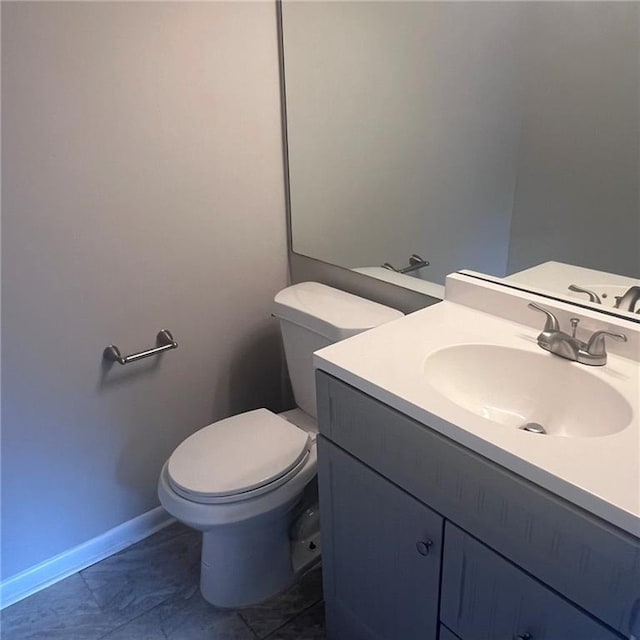 3045 Steeplechase, Alpharetta, GA 30004 - half bathroom with toilet, vanity, and baseboards