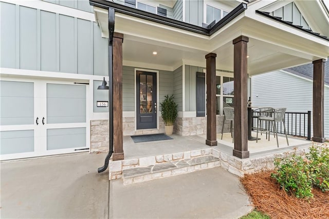 doorway to property featuring a porch