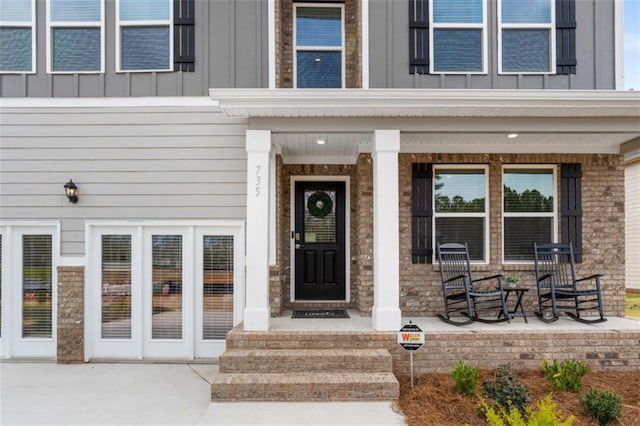 entrance to property with covered porch