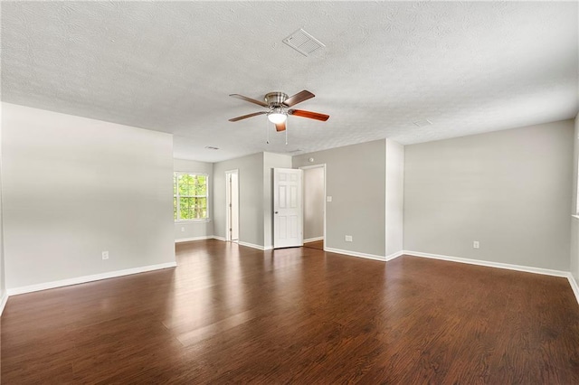 1386 Heritage Glen Dr, Marietta, GA 30068 - unfurnished room featuring ceiling fan, dark wood finished floors, and a textured ceiling