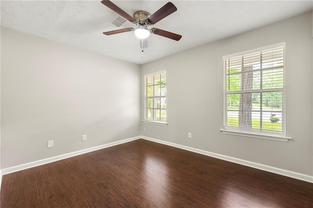 1386 Heritage Glen Dr, Marietta, GA 30068 - empty room with a ceiling fan and dark wood-style floors