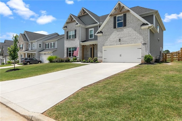 view of front facade featuring a front yard and a garage