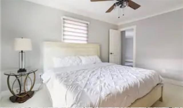 bedroom featuring ceiling fan