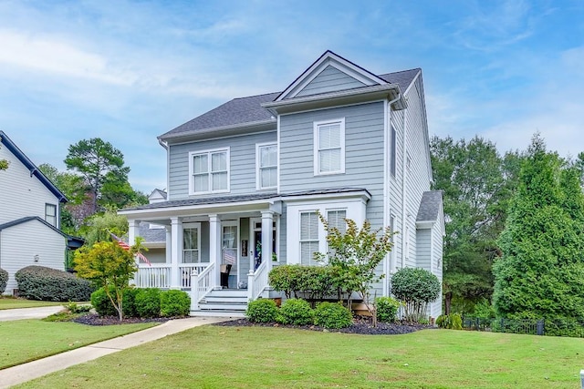 view of front facade featuring a porch and a front yard