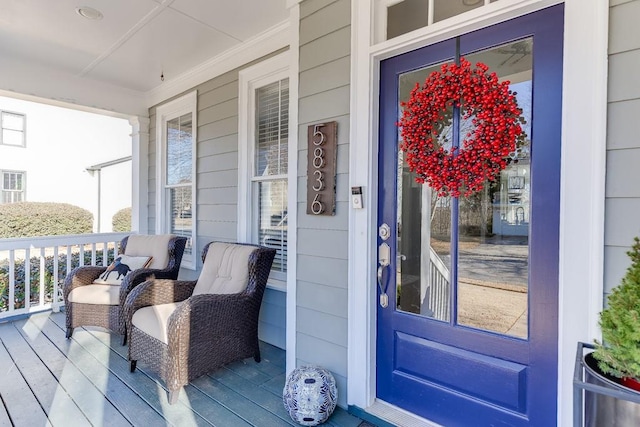 entrance to property with covered porch