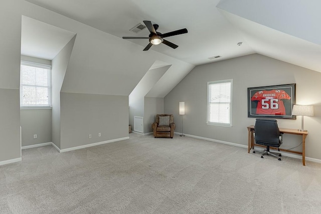 bonus room with ceiling fan, light colored carpet, and vaulted ceiling