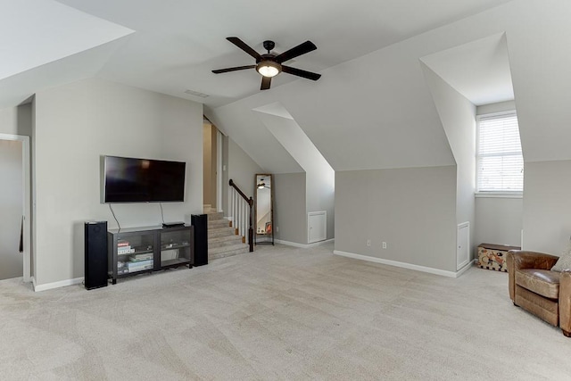 additional living space featuring light carpet, ceiling fan, and vaulted ceiling