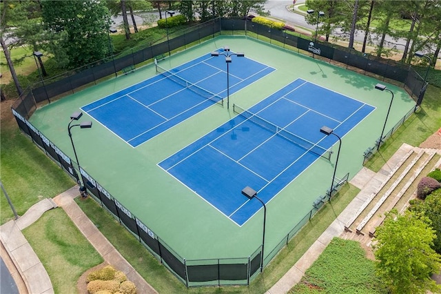 view of sport court with basketball hoop