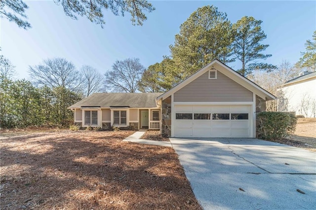 ranch-style home featuring a garage