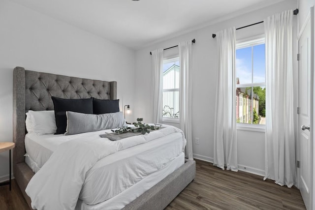 bedroom featuring dark hardwood / wood-style floors