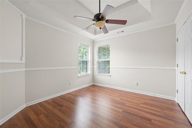 1486 Rogers Crossing Dr, Lithonia, GA 30058 - empty room with wood finished floors, ornamental molding, ceiling fan, a textured ceiling, and baseboards