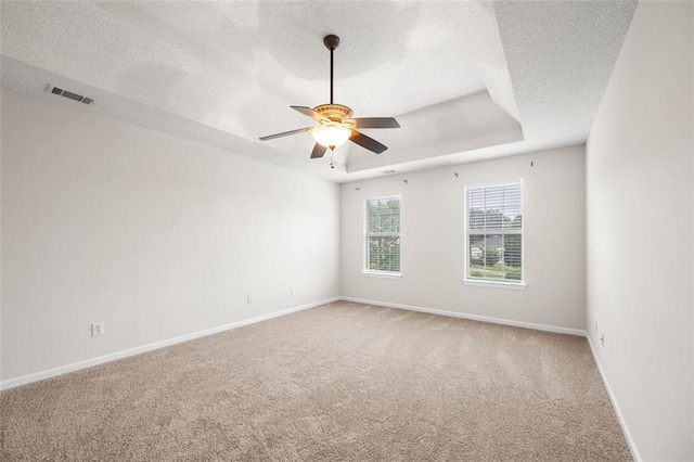 1486 Rogers Crossing Dr, Lithonia, GA 30058 - empty room featuring light colored carpet, ceiling fan, baseboards, and a textured ceiling