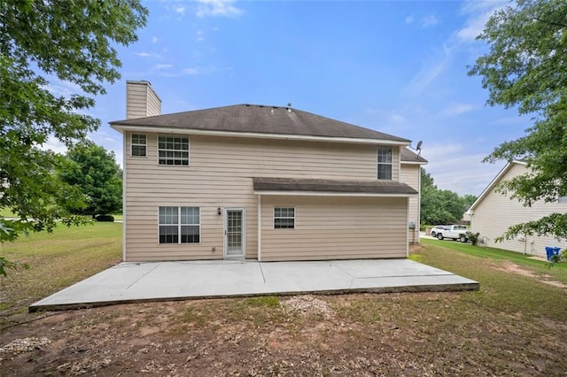 1486 Rogers Crossing Dr, Lithonia, GA 30058 - rear view of house with a patio area, a lawn, and a chimney