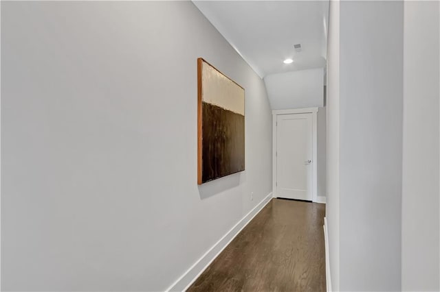 hall with dark hardwood / wood-style floors