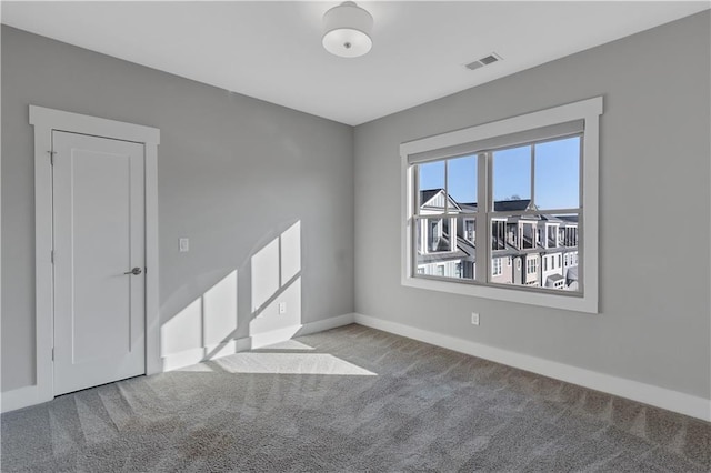 view of carpeted spare room