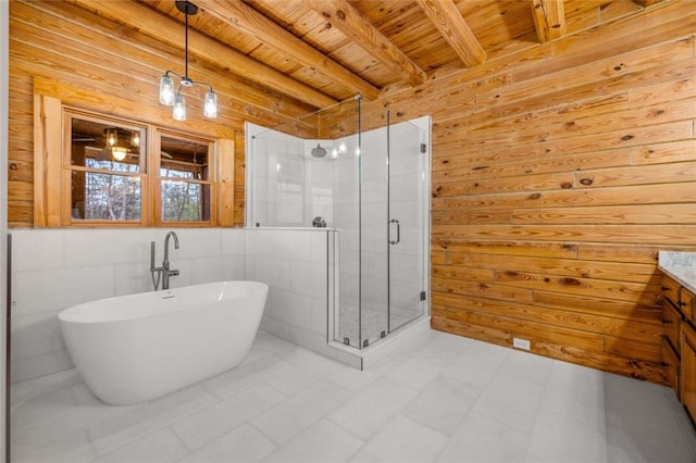 5505 Whitehall Rd, Lula, GA 30554 - full bath featuring a freestanding tub, a stall shower, wooden ceiling, beam ceiling, and wood walls