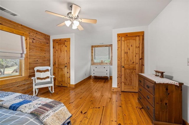 5505 Whitehall Rd, Lula, GA 30554 - bedroom with baseboards, visible vents, light wood-style floors, and a ceiling fan