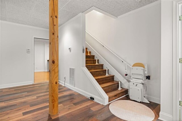 5505 Whitehall Rd, Lula, GA 30554 - stairs featuring ornamental molding, baseboards, and wood finished floors