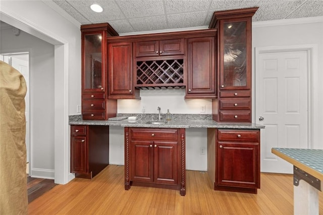 5505 Whitehall Rd, Lula, GA 30554 - bar with crown molding, wet bar, light wood-style flooring, and a sink