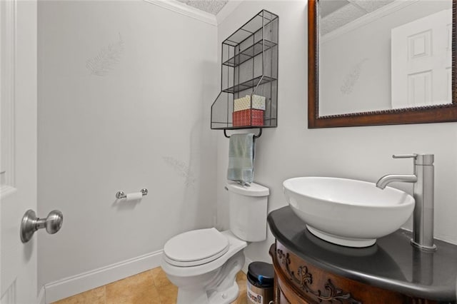 5505 Whitehall Rd, Lula, GA 30554 - half bath featuring vanity, crown molding, toilet, baseboards, and tile patterned floors